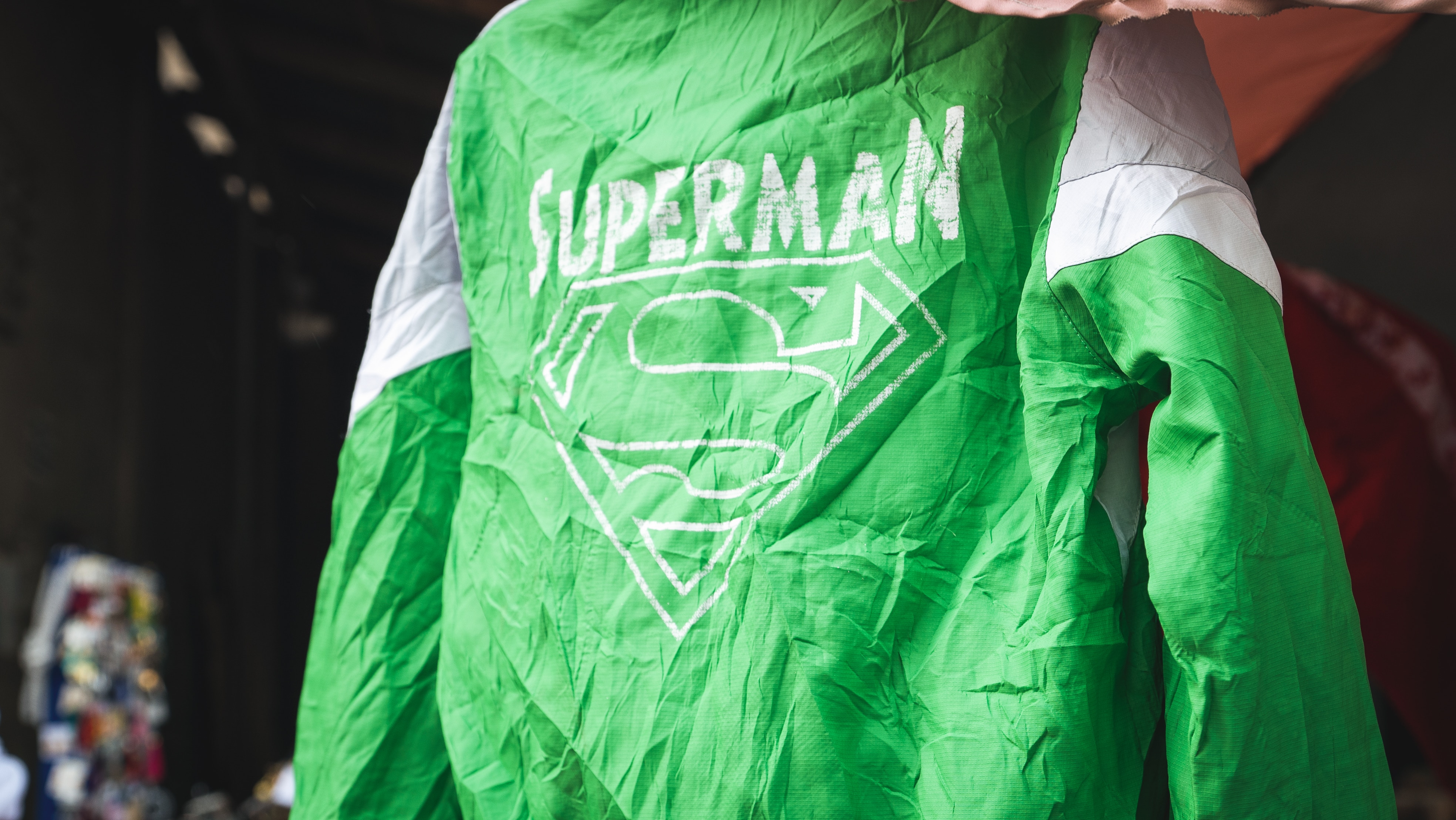 A green superman jacket.