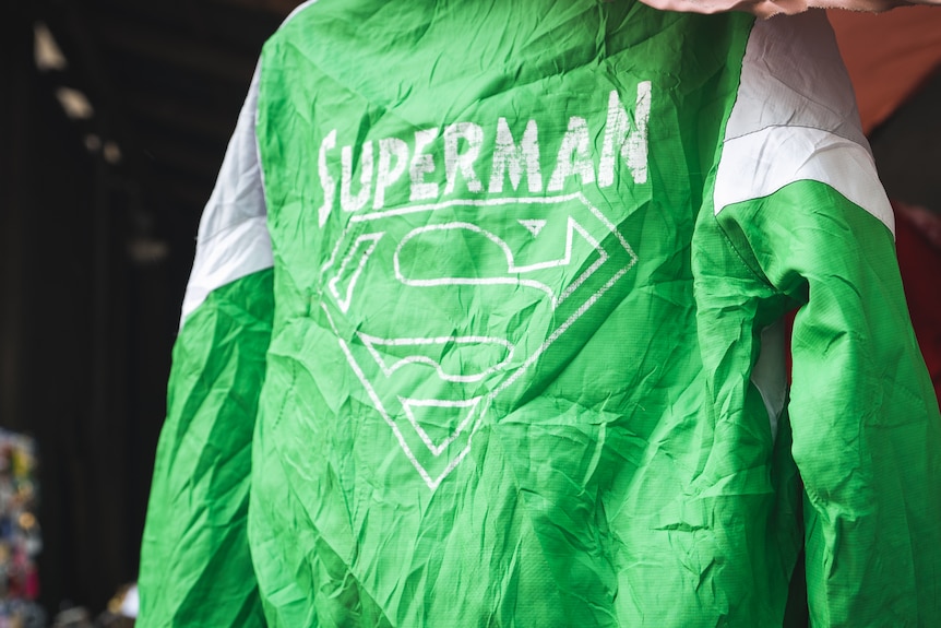 A green superman jacket.