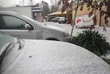 Hail blankets cars at Stirling in the Adelaide Hills