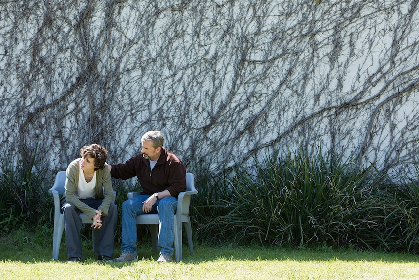 Steve Carrell and Timothée Chalamet sitting in garden in Beautiful Boy