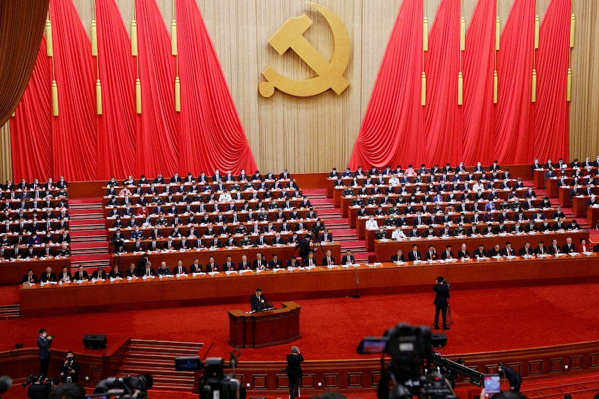 A large hall under the hammer and sickle image