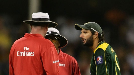 Getting a gobful: Afridi told umpires he was 'smelling' the ball despite TV cameras showing otherwise.