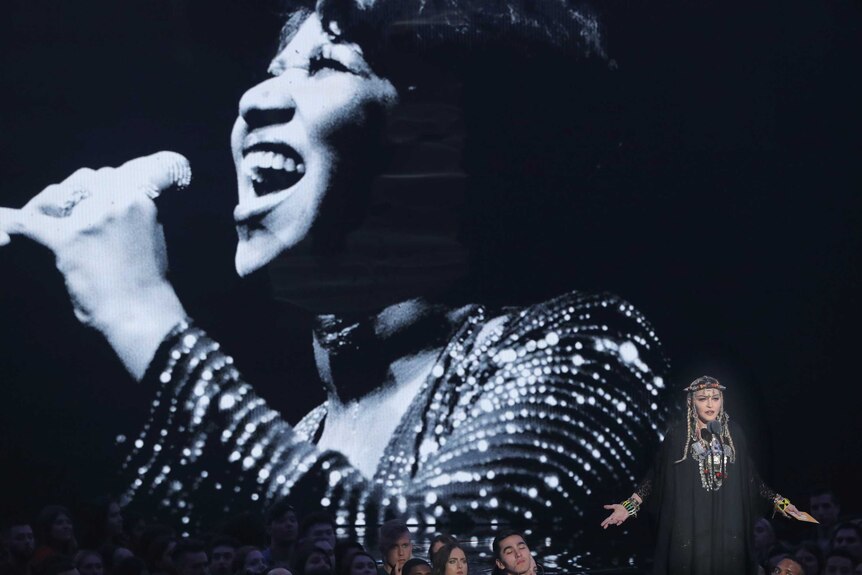 Madonna speaks during a tribute to the late singer Aretha Franklin.