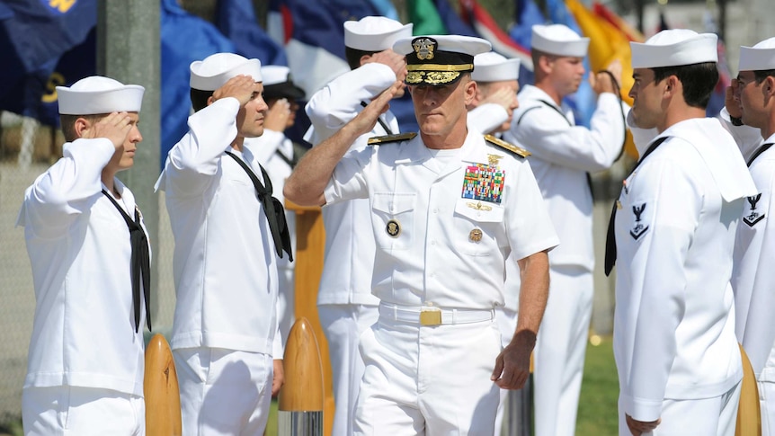 Vice-Admiral Robert Harward salutes during a SEAL Team 5 change of command ceremony in San Diego on July 11, 2011.
