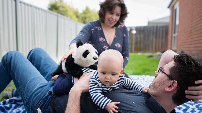 Mother Kira Longfield, husband Jared and their baby William at their Pakenham home.