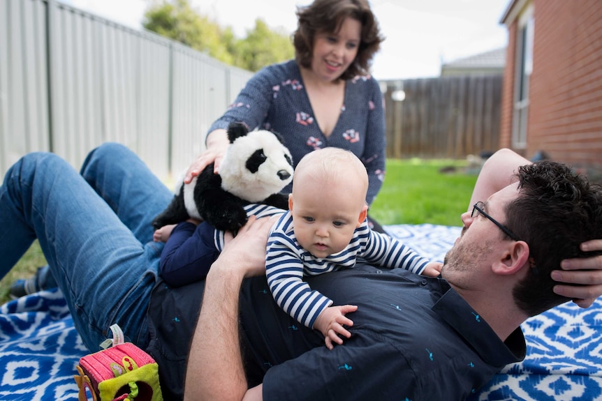 Mother Kira Longfield, husband Jared and their baby William at their Pakenham home.