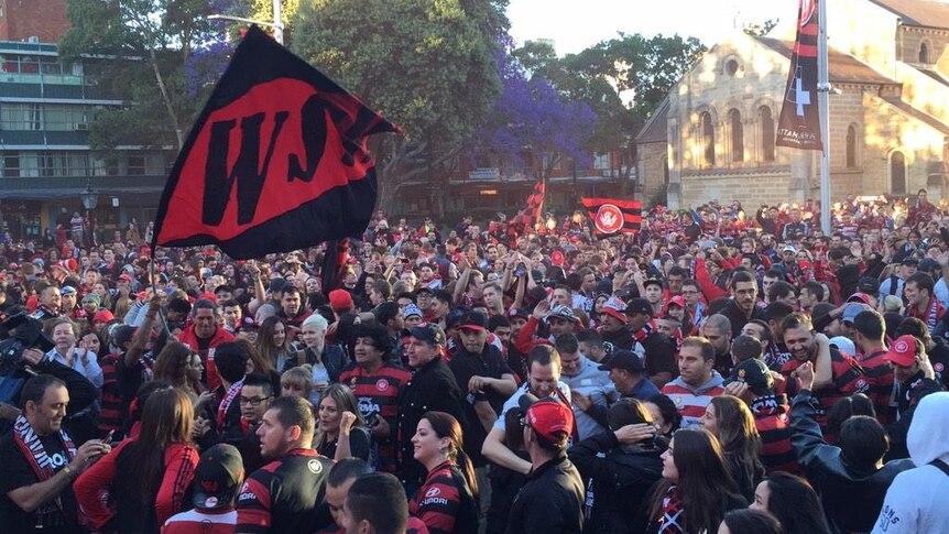 Hundreds of Western Sydney Wanderers fans in Parramatta celebrate a win
