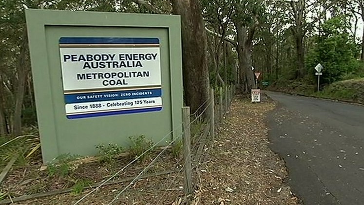 a sign on road saying Peabody Energy australia Metropolitan Coal