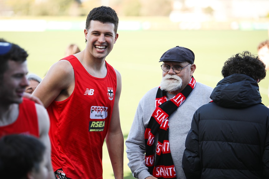 Robert Muir chats with Rowan Marshall at a St Kilda training session.