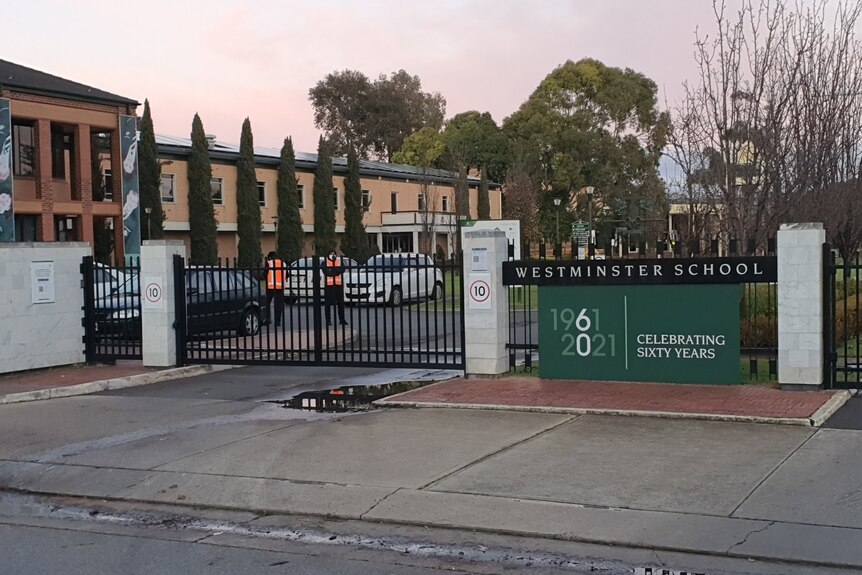 A school with the gate closed