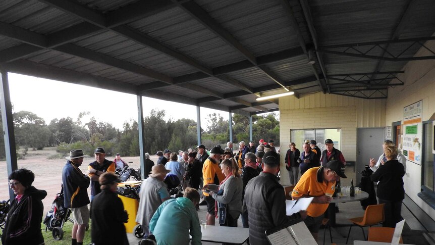 Golfers mingling before tee off on the first hole at Ceduna.