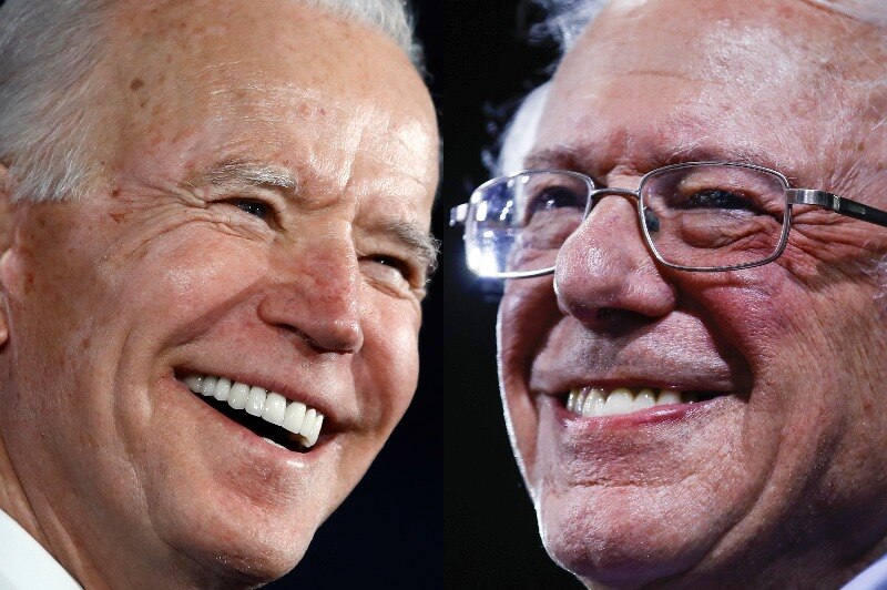 A composite image of Joe Biden and Bernie Sanders smiling