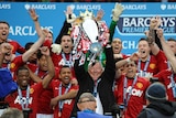 Ferguson celebrates another United trophy