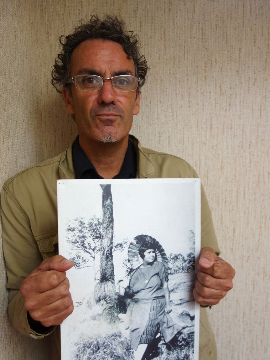 Steve Kinnane with a photograph of his grandmother, domestic servant Jessie Smith.