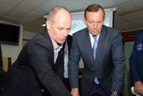 Campbell Newman shows Tony Abbott a map of the Torres Strait