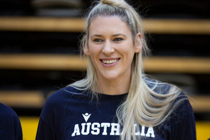 Lauren Jackson smiles while posing for a photo at the State Basketball Centre