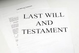 Document on table saying Last Will and Testament