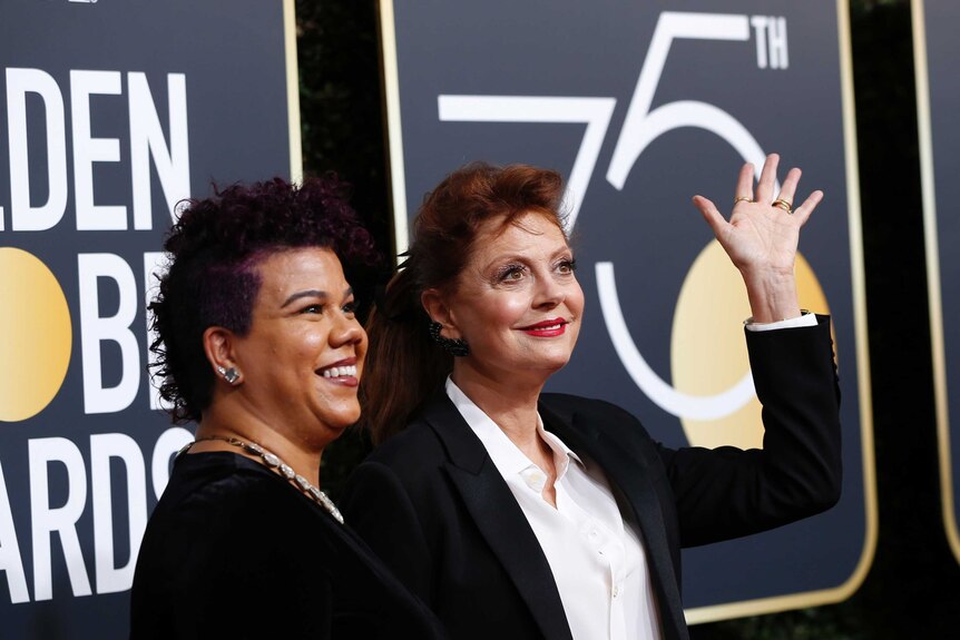 Activist Rosa Clemente and actress Susan Sarandon both wearing black.