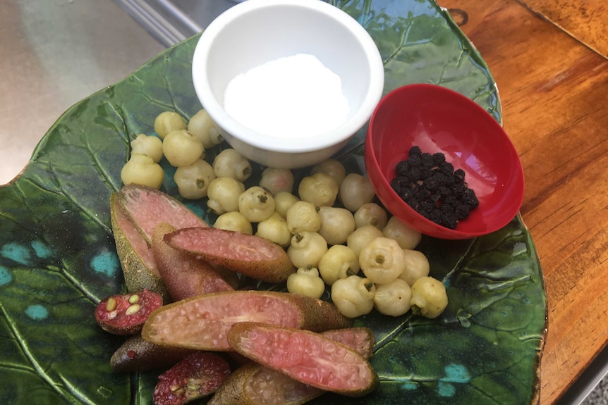 A plate of bush tucker including finger lime and lemon aspen.