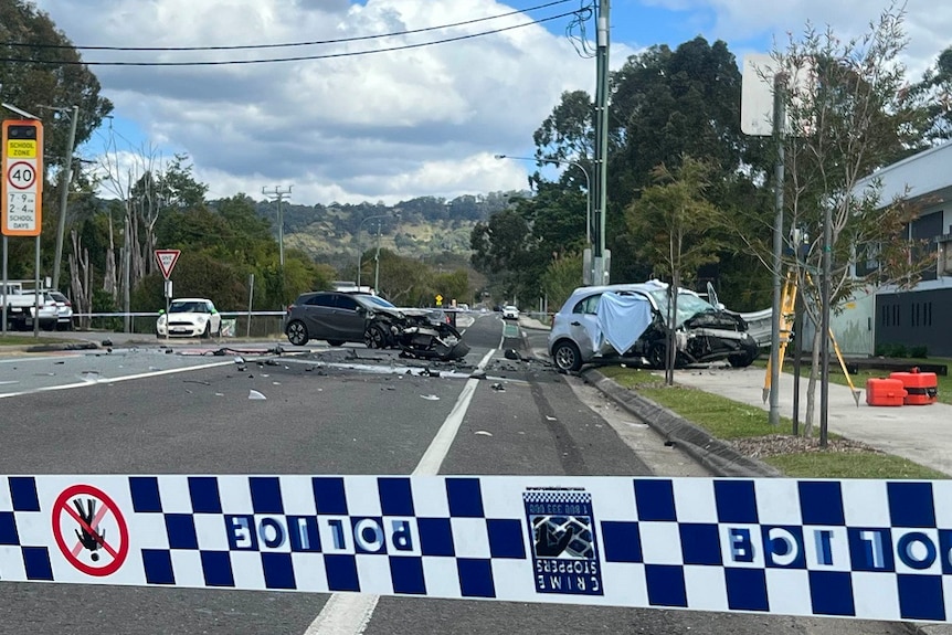 Two vehicles smashed on a road outside a school in Nambour.