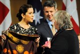Princess Mary of Denmark and Prince Frederik of Denmark recieve a present from an Aboriginal elder.