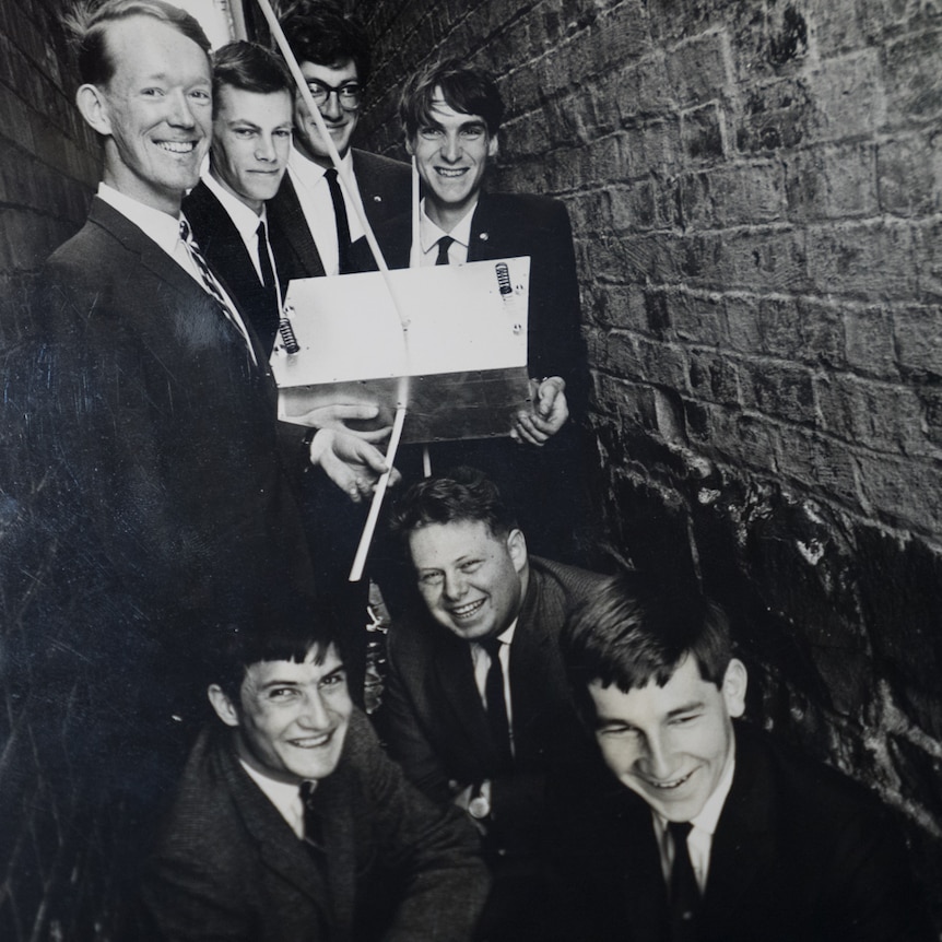 Students with the satellite payload.