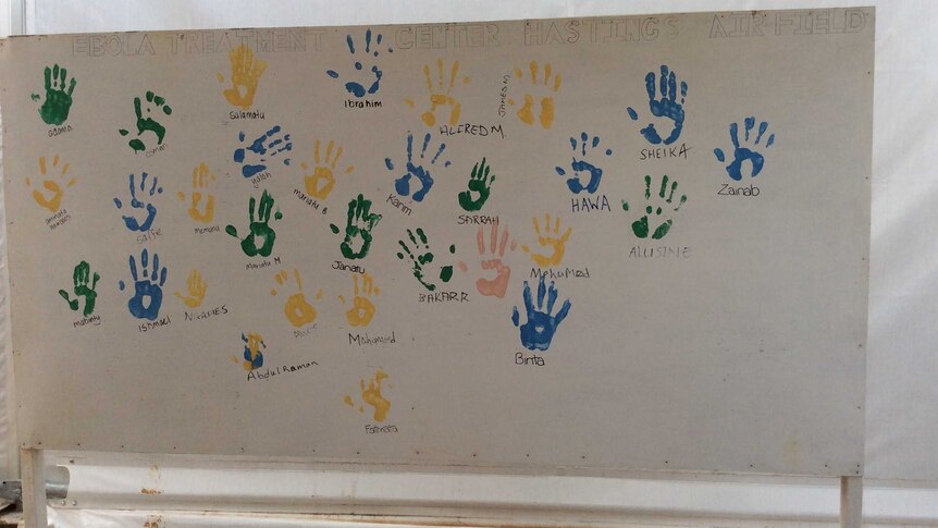 Ebola survivors placed their handprint on the wall to give hope to other patients and health care workers.