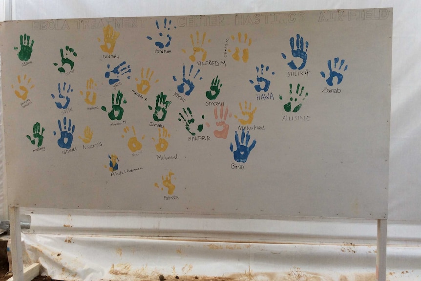 Ebola survivors placed their handprint on the wall to give hope to other patients and health care workers.