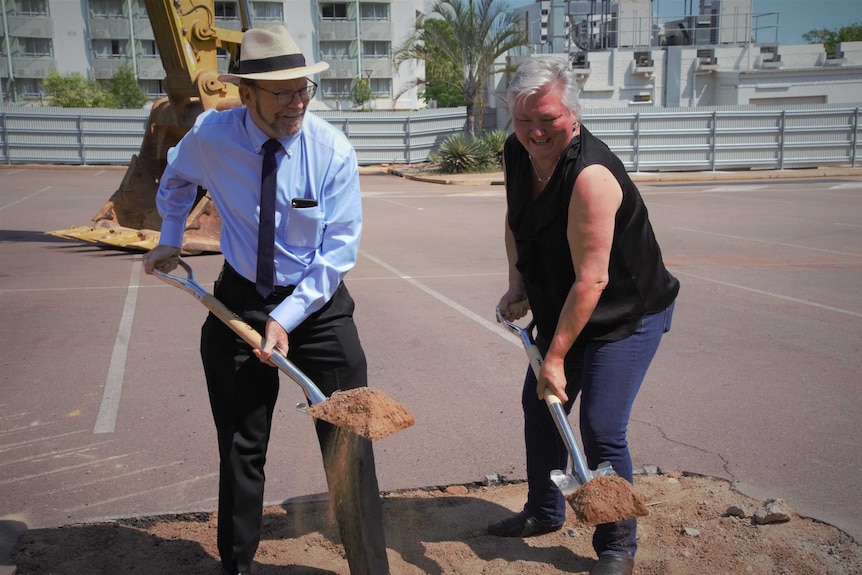 Simon Maddocks and Sam MacMahon digging at a carpark site in Darwin. Photo taken 14 October 2020.