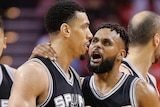 Patty Mills congratulates Danny Green of the Spurs