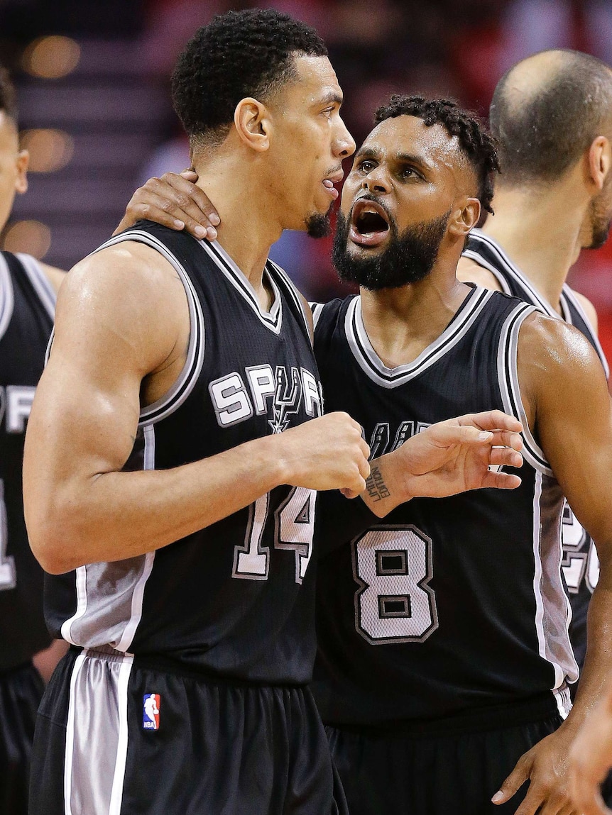 Patty Mills congratulates Danny Green of the Spurs