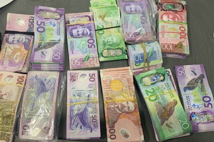 Over $100k in cash taken from men trying to take it into Auckland