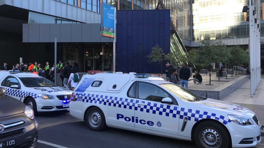 Police on the scene at Flagstaff train station in Melbourne.