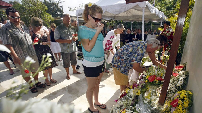 Relatives of victims of the 2002 Bali bombing lay a wreath at the Australian Consulate in Denpasar