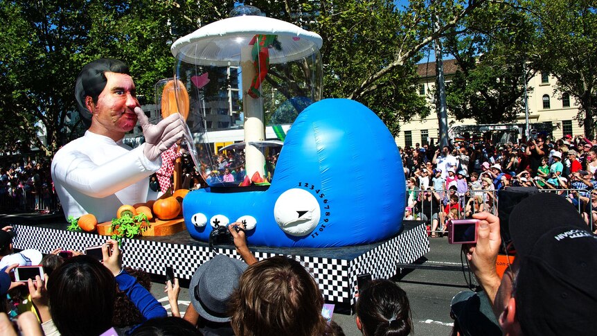 Crowds watch the the annual Moomba parade in Melbourne.