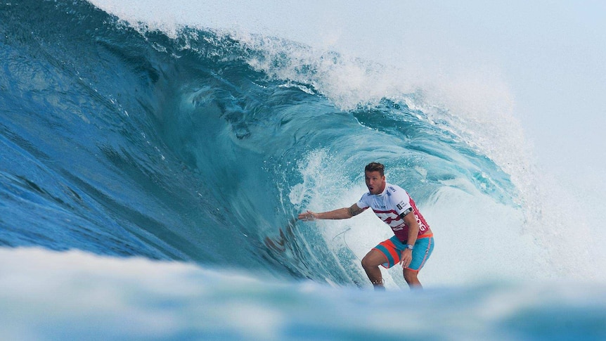 Mitch Crews gets barrelled at Pipeline