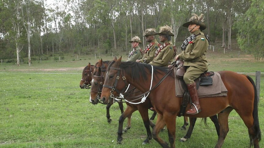 Indigenous descendants of the Australian Light Horsemen on horseback in uniform