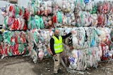 replas general manager paul hone stands with bales of redcycle collected soft plastics