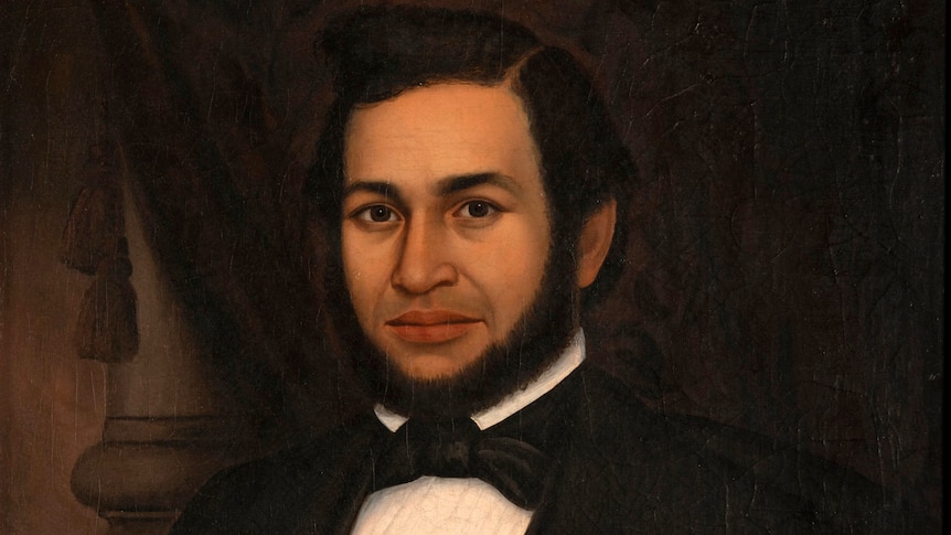 An 18th century painting of an African American man in a suit