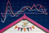 The roof of a house with chart of house prices superimposed.