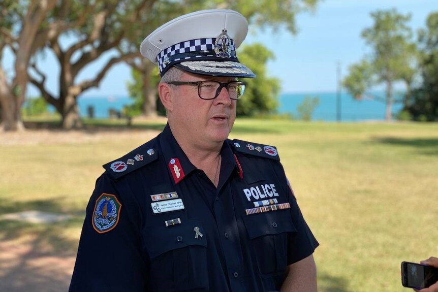 NT Police Commissioner Jamie Chalker is wearing a uniform and talking into a camera.