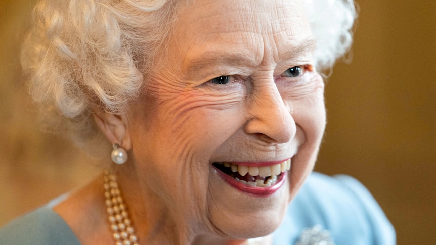 Queen Elizabeth smiles at a reception for her Platinum Jubilee, February 5, 2022.