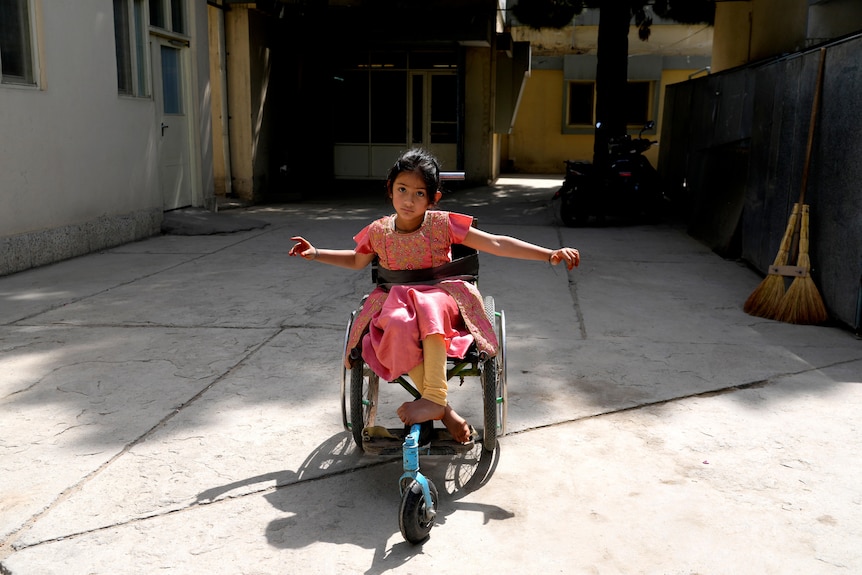 A paralysed child victim of polio