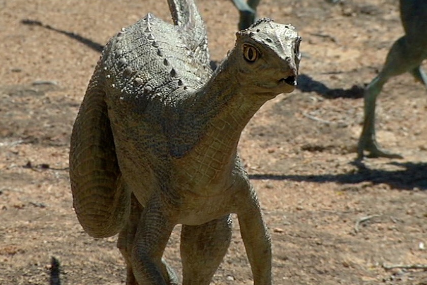 Small brass dinosaur