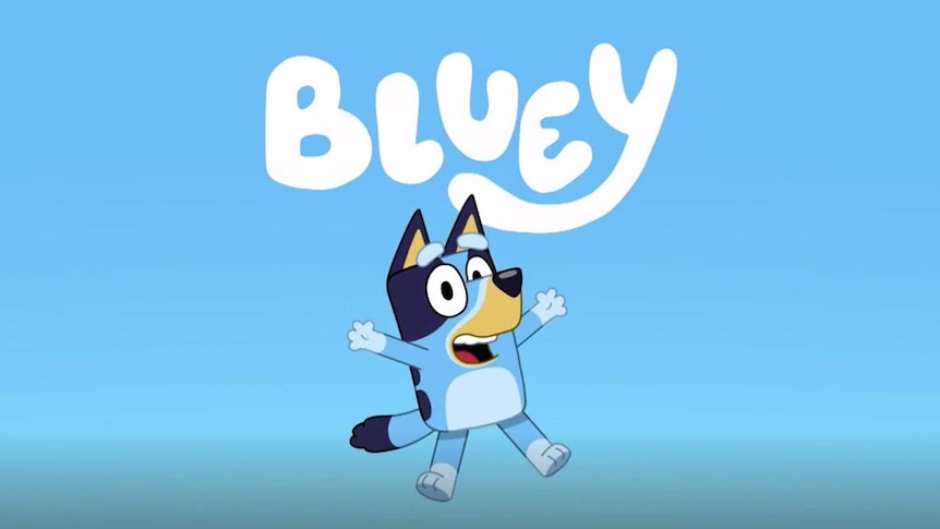 Bluey standing with arms outstretched with the text 'Bluey'