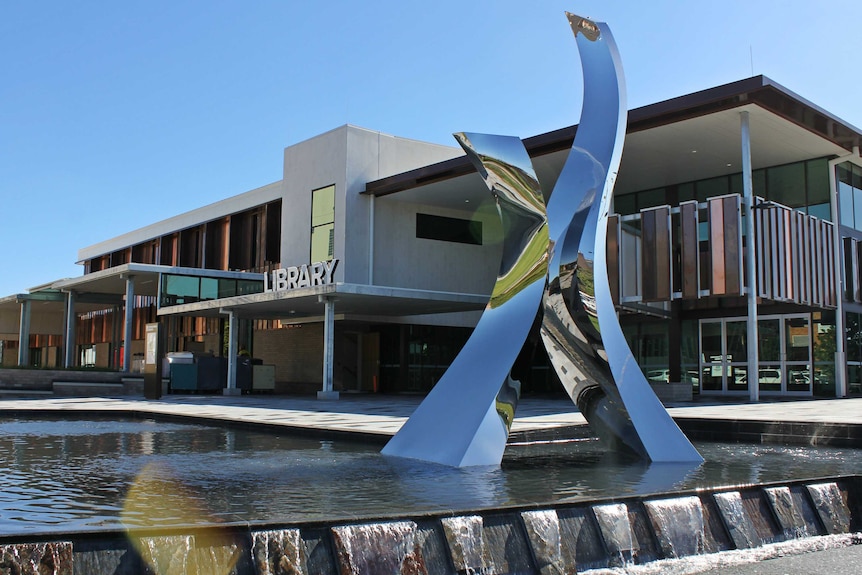 Toowoomba City Library with a water fountain outside.