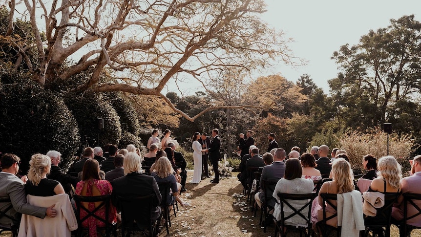 Celebrant Josh Withers presides over a ceremony