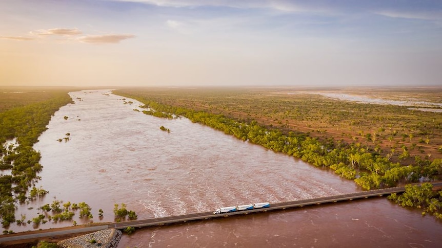 Aerial photo of truck driving over flooded river crossing