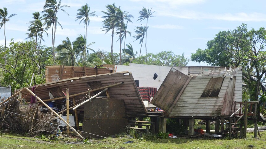 The walls of a house fall open in Fiji, after Tropical Cyclone Winston causes devastation.