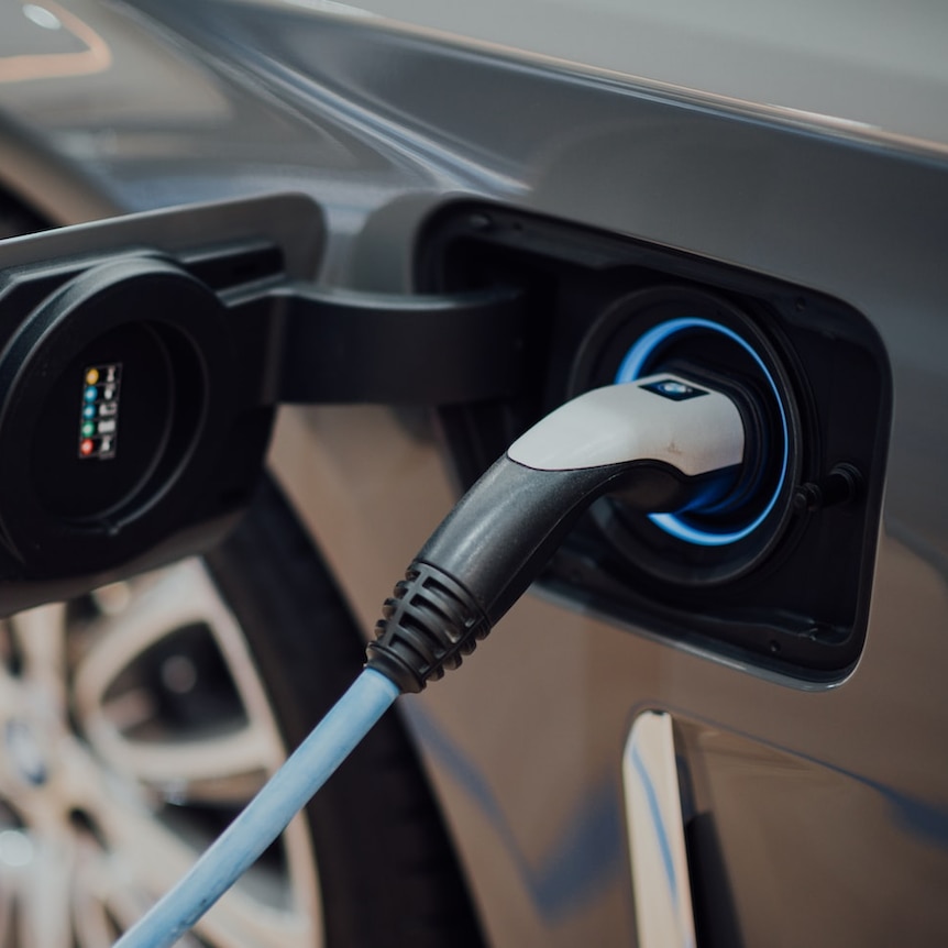A close up of the charge in an electric car.
